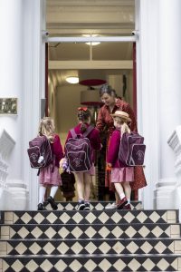 girls going into school
