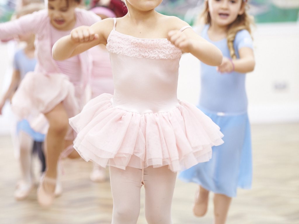 A schoolgirl practicing ballet